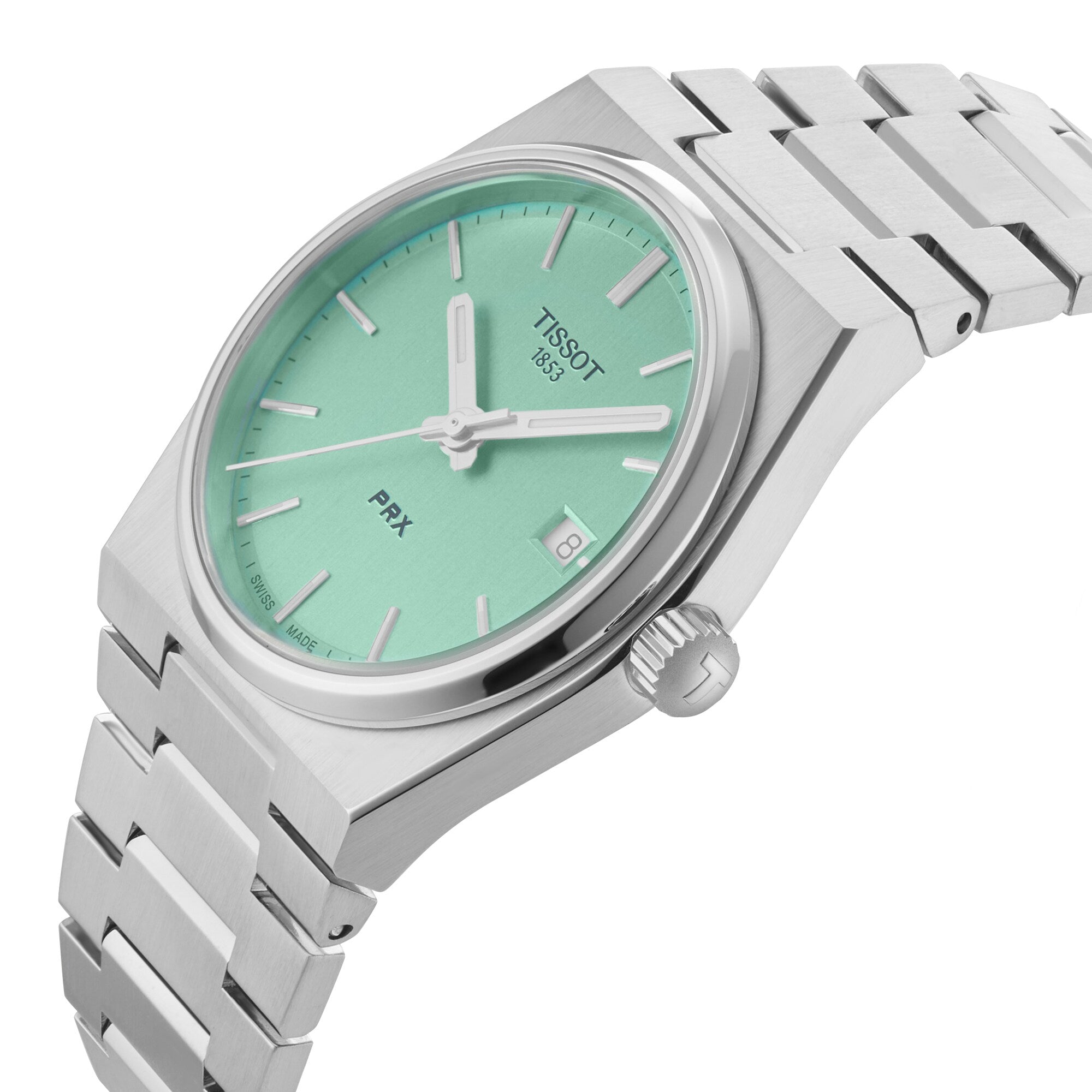 A Tissot PRX watch in silver with a mint green dial, date window at 3 o’clock, and metal link bracelet is shown at an angle on a white background.
