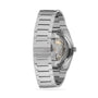 The Tissot PRX Powermatic 80 is a stainless steel wristwatch with an automatic movement, visible through a sapphire crystal case back, and features a detailed bracelet and clasp.