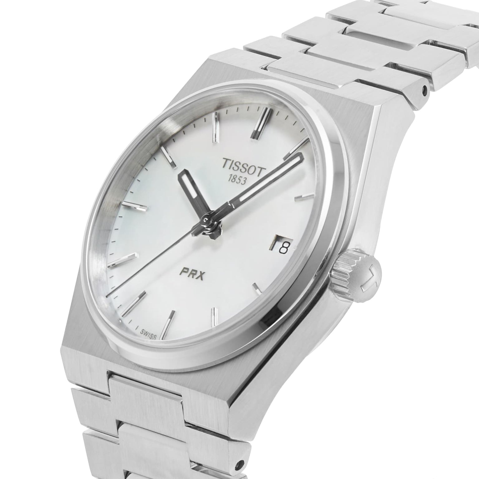The Tissot PRX watch features a stainless steel bracelet, white dial, date display, and baton hour markers—displayed at an angle.