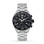 A TAG Heuer Formula 1 Chronograph wristwatch with a black dial, tachymeter bezel, three subdials, and a stainless steel link bracelet is displayed against a white background.