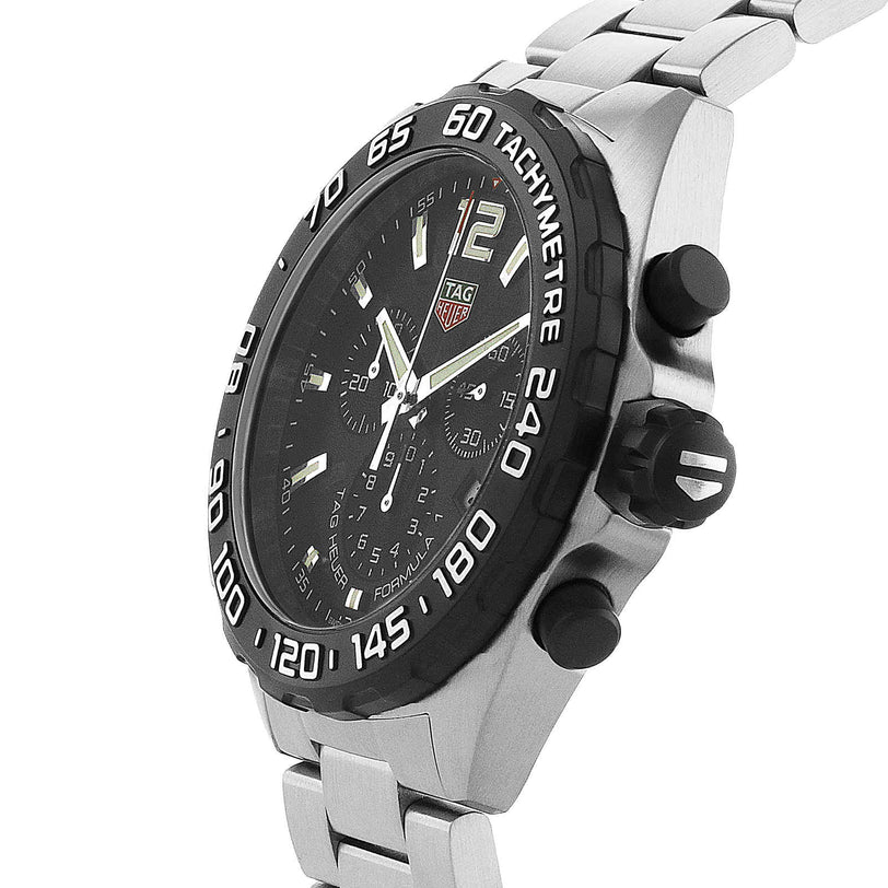 The TAG Heuer Formula 1 Chronograph features a black tachymeter bezel, black dial with three subdials, chronograph functions, and a stainless steel link bracelet.