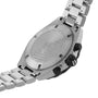 The image shows the back of a TAG Heuer Formula 1 Chronograph wristwatch featuring an engraved stainless steel caseback and a metal link bracelet.