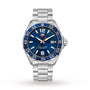 The TAG Heuer Formula 1 Date features a striking blue sunray dial, date window at 3 oclock, blue bezel, and a stainless steel bracelet.