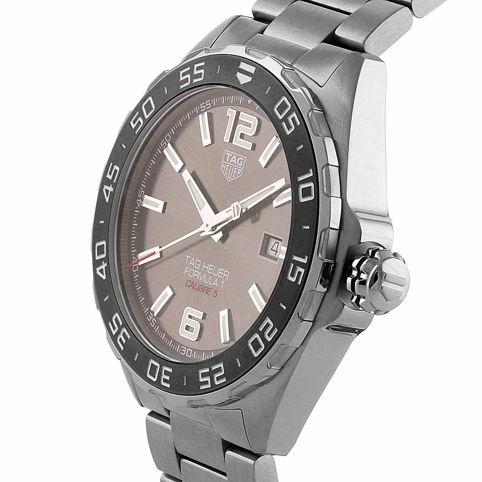 The TAG Heuer Formula 1 Date is a stainless steel wristwatch with a tachymeter bezel, grey dial, date display, automatic movement, and metal bracelet.