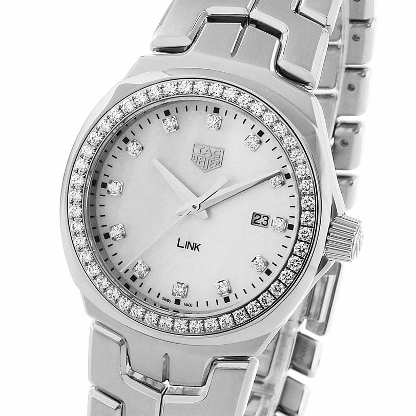 The TAG Heuer Link Date features a silver metal band, diamond bezel and markers, plus a date display at 3 o’clock.