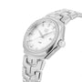 TAG Heuer Link Date watch with diamond bezel, white dial, and metal bracelet, shown at an angle.