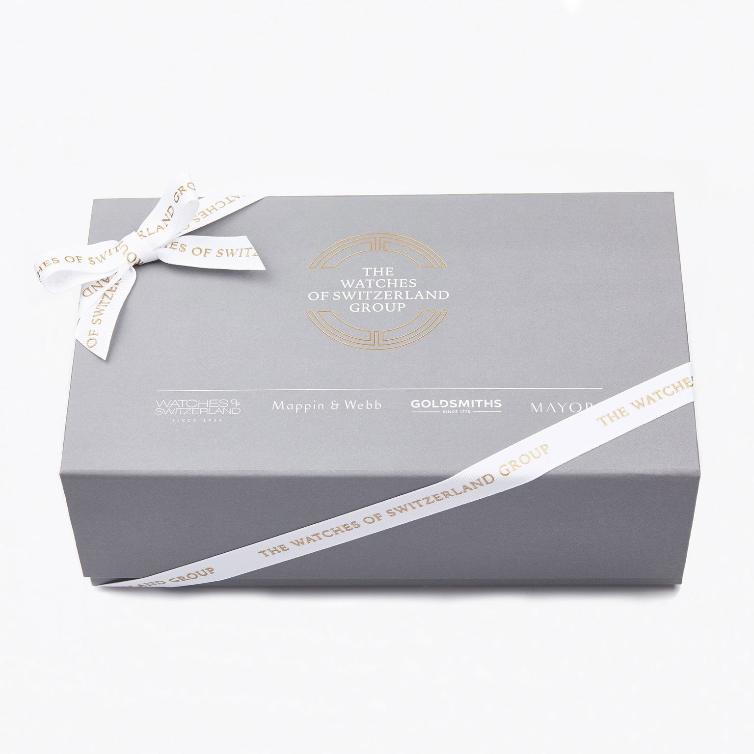 A grey gift box with The Watches of Switzerland Group logo, branded ribbon, and Goldsmiths, Mappin & Webb, and Mayors names on the lid—ideal packaging for a TAG Heuer Aquaracer Date sports watch.