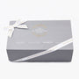 A grey gift box with The Watches of Switzerland Group logo, branded ribbon, and Goldsmiths, Mappin & Webb, and Mayors names on the lid—ideal packaging for a TAG Heuer Aquaracer Date sports watch.