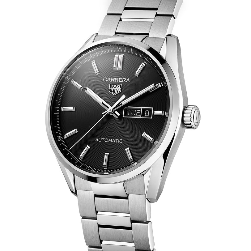 The TAG Heuer Carrera Day-Date is a stainless steel wristwatch with a black azurage dial, silver hour markers, day-date display, and calibre 5 automatic movement.