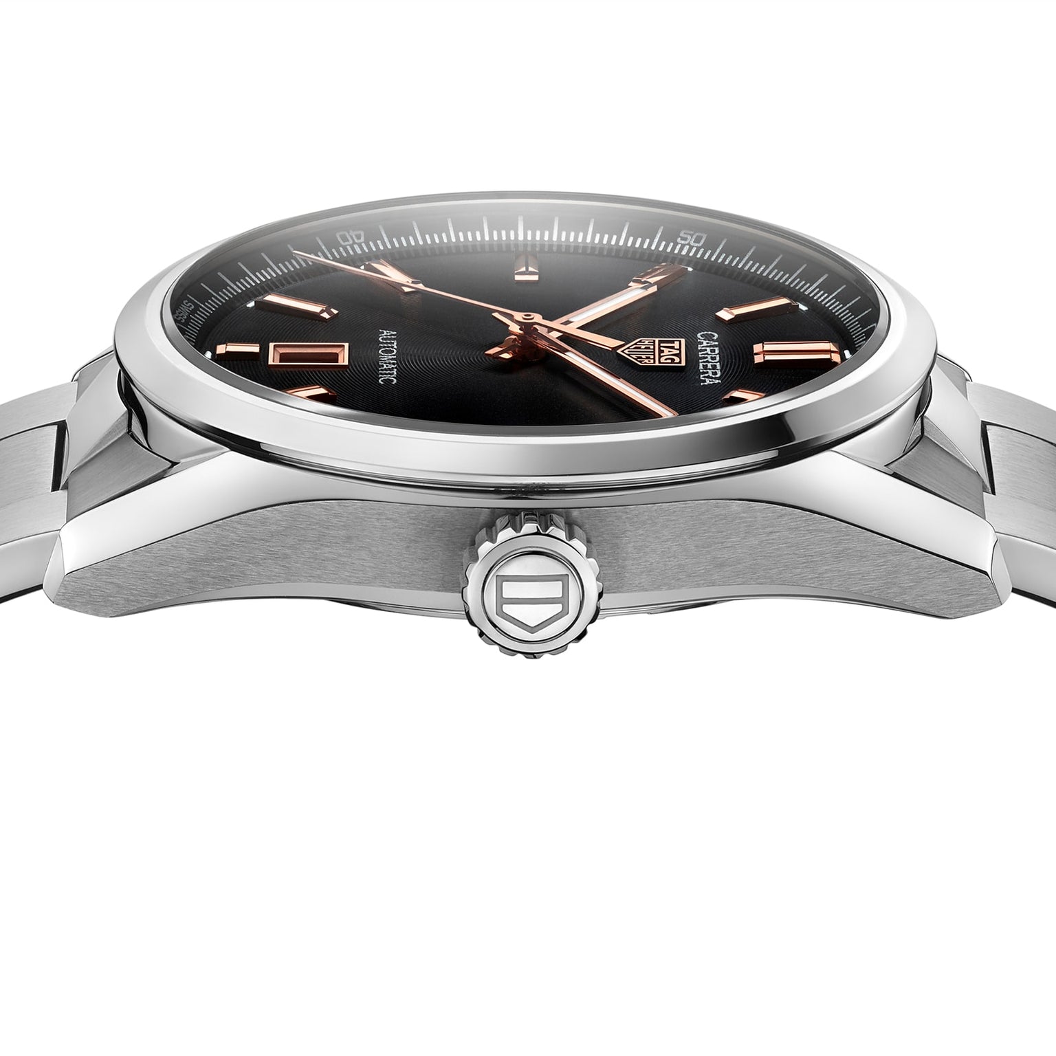 A close-up side view of the TAG Heuer Carrera Date watch, featuring a stainless steel case, black dial, rose gold hour markers and hands, and a branded crown.
