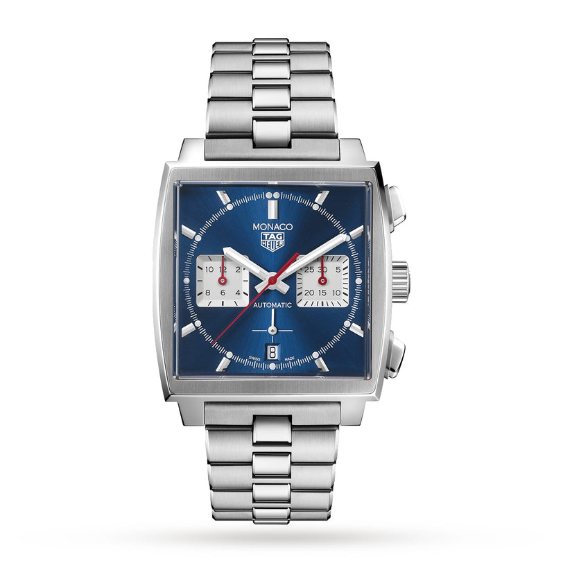 The TAG Heuer Monaco Chronograph features vintage styling with a blue square dial, two white subdials, a date window at 6 o’clock, and a silver metal bracelet.