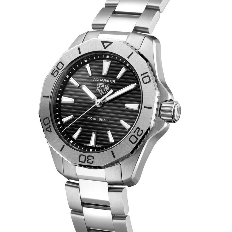 The TAG Heuer Aquaracer Professional 200 is a sports watch with a stainless steel case and band, black dial, silver hour markers, and a numbered rotating bezel.