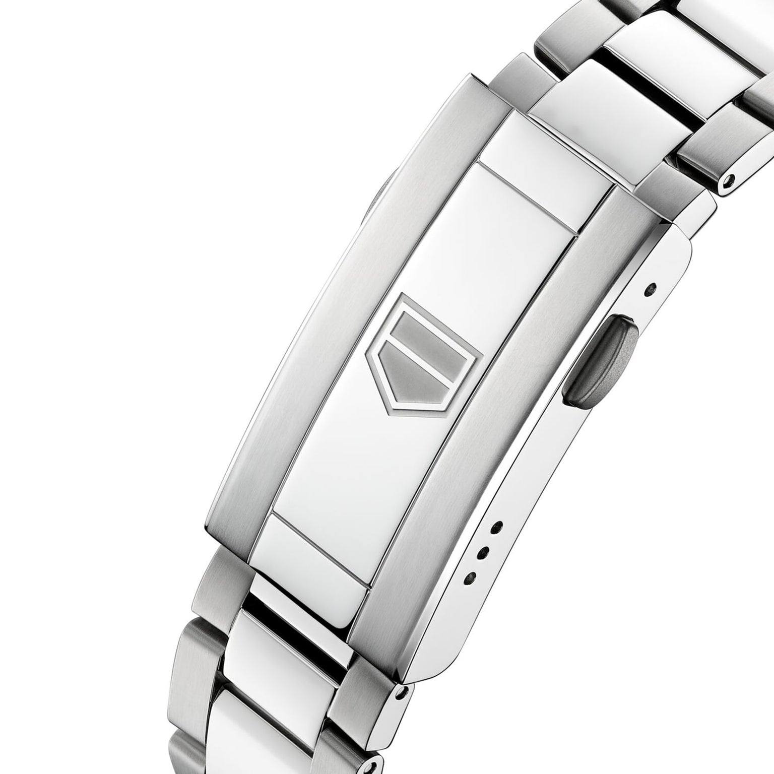 The TAG Heuer Aquaracer Professional 200s silver metal clasp features an engraved geometric logo, displayed in close-up on a white background.