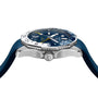 Side view of the TAG Heuer Aquaracer Professional 300 GMT with a blue strap, silver case, white and blue bezel, blue dial, silver crown, and precise GMT movement.