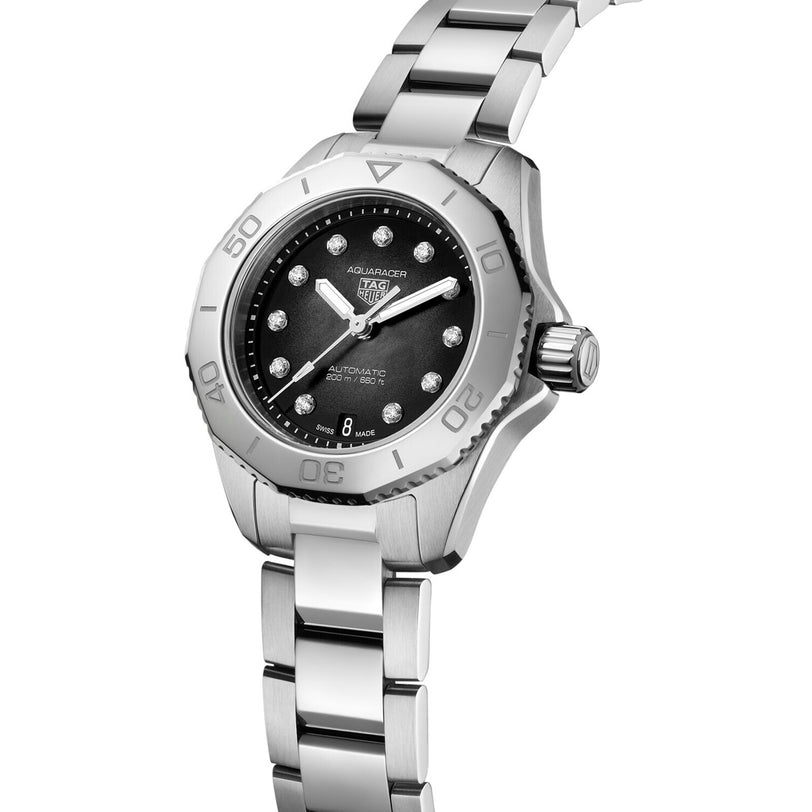 A TAG Heuer Aquaracer Professional 200 Date with a black mother-of-pearl dial, diamond hour markers, stainless steel case, and metal link bracelet.