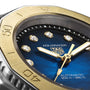 Close-up of a TAG Heuer Aquaracer Professional 200 Date sports watch featuring a blue dial, gold hands, diamond hour markers, and a gold bezel marked at 40 and 50 minutes.