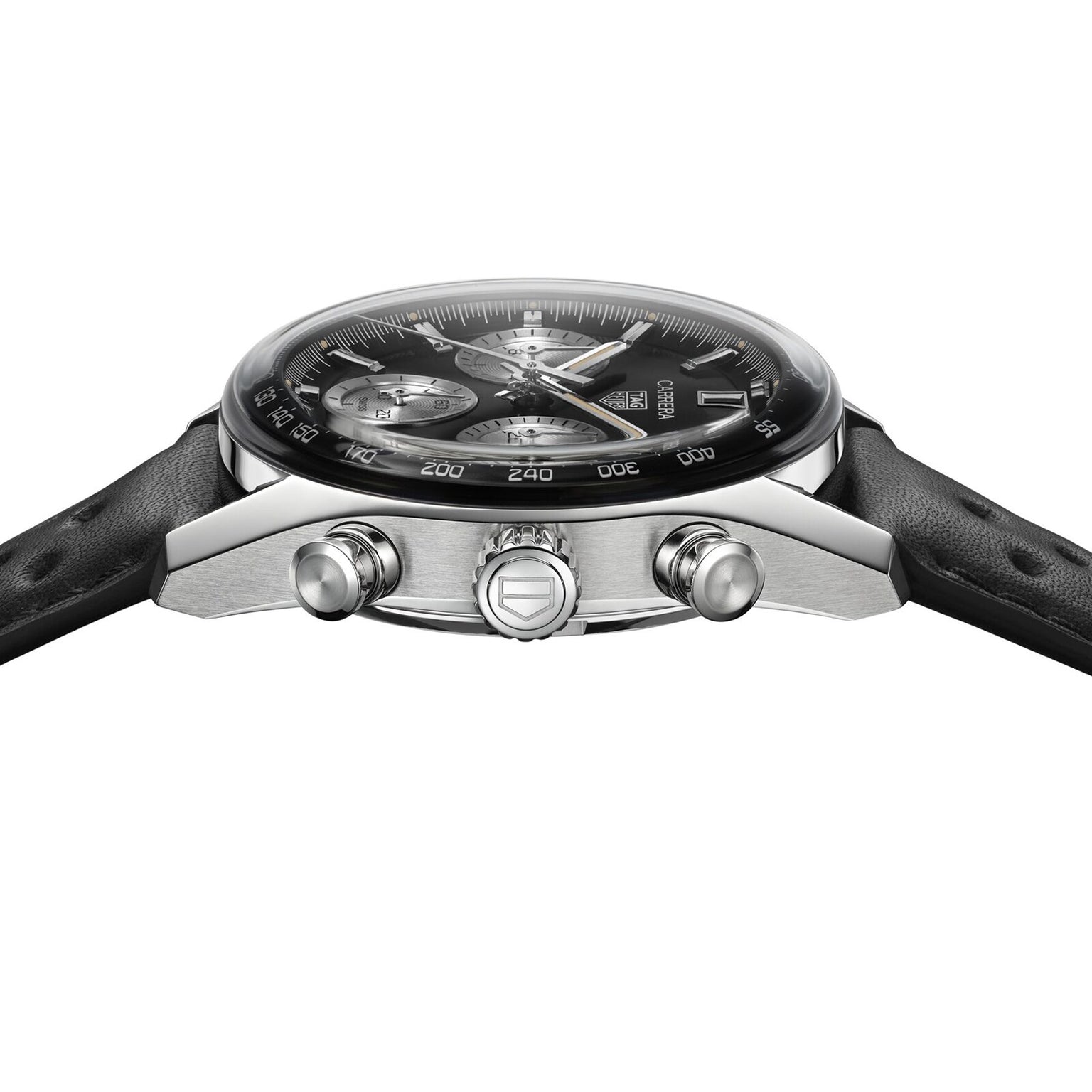 A close-up side view of the TAG Heuer Carrera Chronograph, featuring an analog display, black leather strap, silver accents, two side push buttons, and automatic movement.