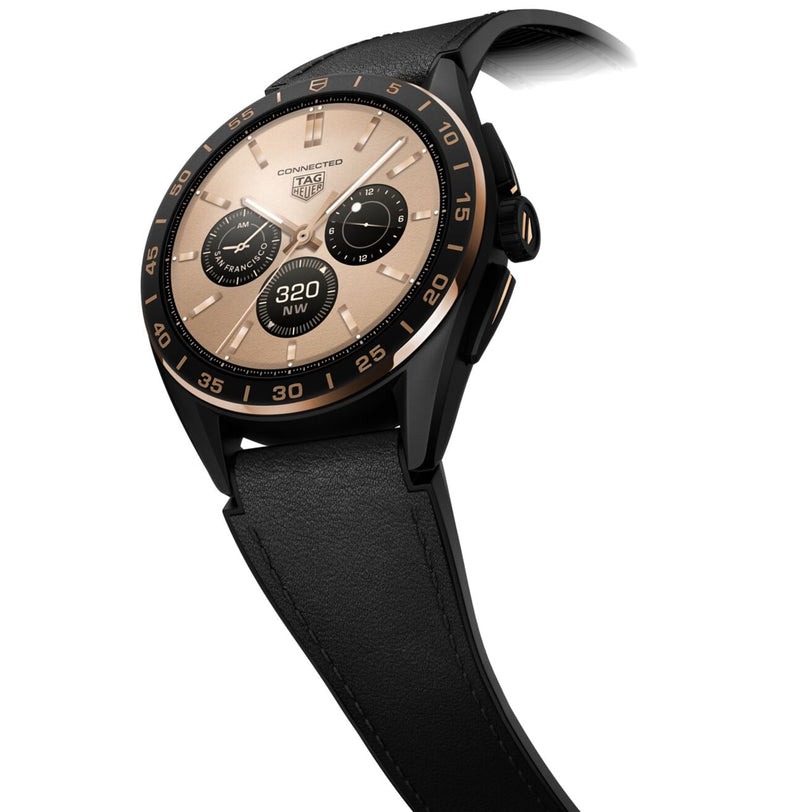 The TAG Heuer Limited Edition Connected Calibre E4 Bright Black Edition features a black case, gold bezel, black leather strap, and an avant-garde gold and black digital face for a luxurious look.