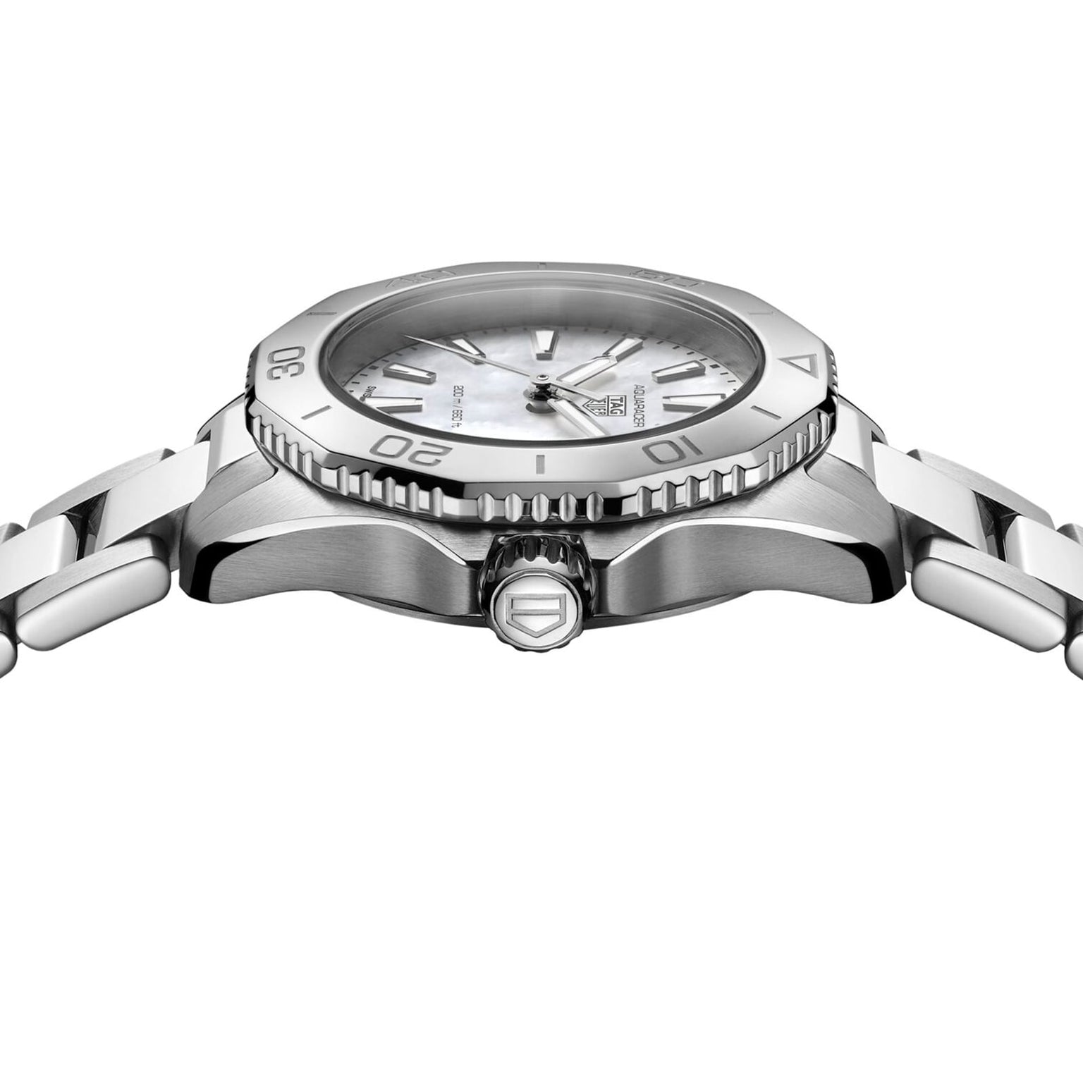 Side view of a TAG Heuer Aquaracer Professional 200 stainless steel sports watch with metal bracelet, ridged bezel, mother-of-pearl dial, logo on the crown, and precise quartz movement.