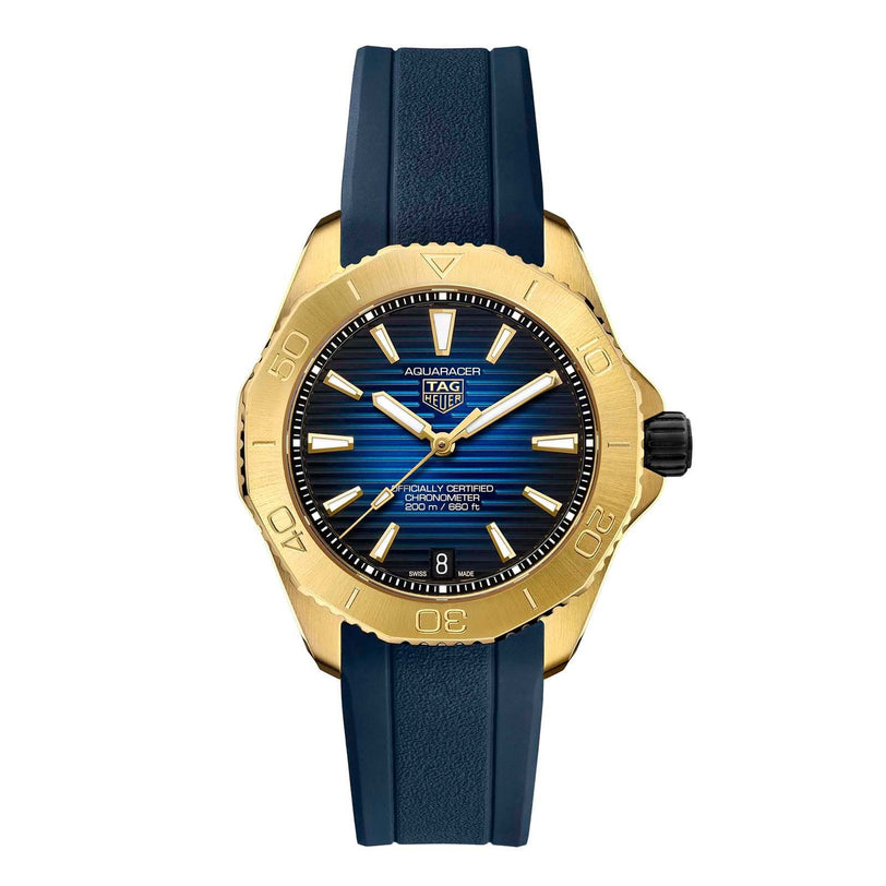 The TAG Heuer Aquaracer Professional 200 Date features a yellow gold-tone case, blue textured dial, gold hour markers, TH31-00 calibre movement, blue rubber strap, and a date window at 6 o’clock.