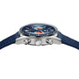 Side view of the TAG Heuer Carrera Chronograph Skipper, featuring a silver case, blue strap, and detailed airplane design on the watch face.