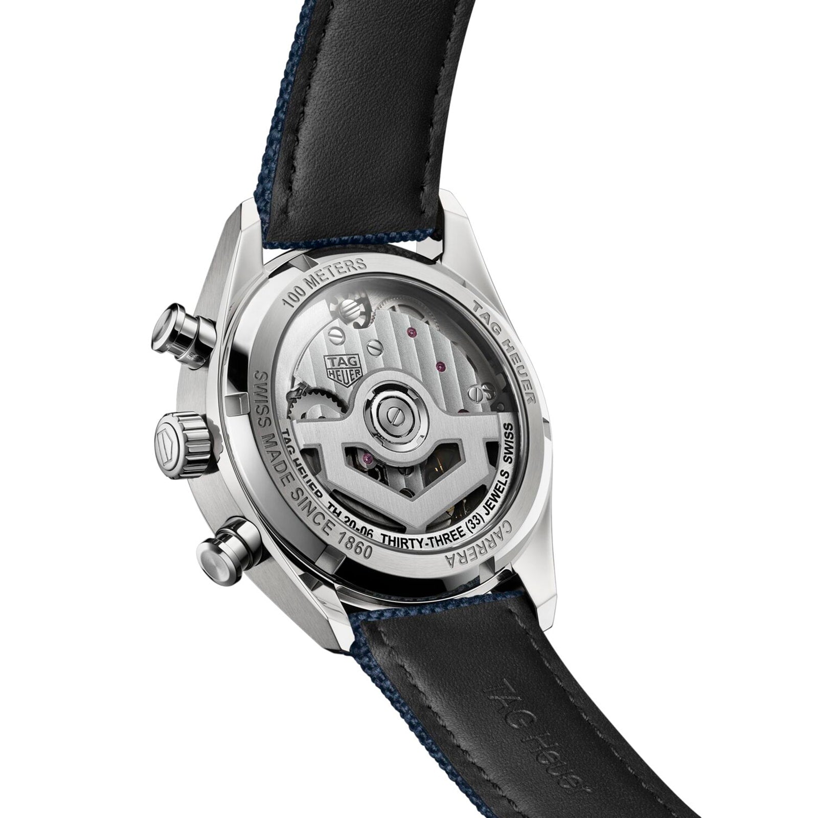 The Carrera Chronograph Skipper by TAG Heuer features a back view with an exposed automatic movement, visible inscriptions, and a black leather strap accented with blue stitching.