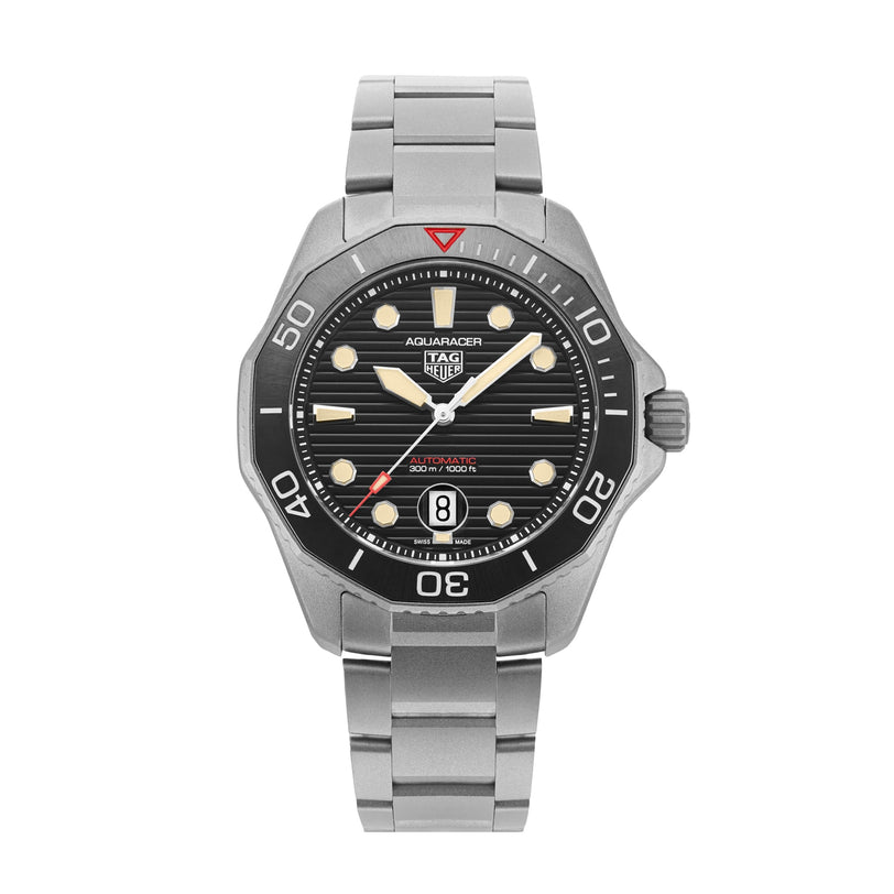 The TAG Heuer Limited Edition 1 of 500 Aquaracer Professional 300 features a stainless steel case, black dial, silver hour markers, date at 6 oclock, unidirectional bezel, and precise Calibre 5 automatic movement.