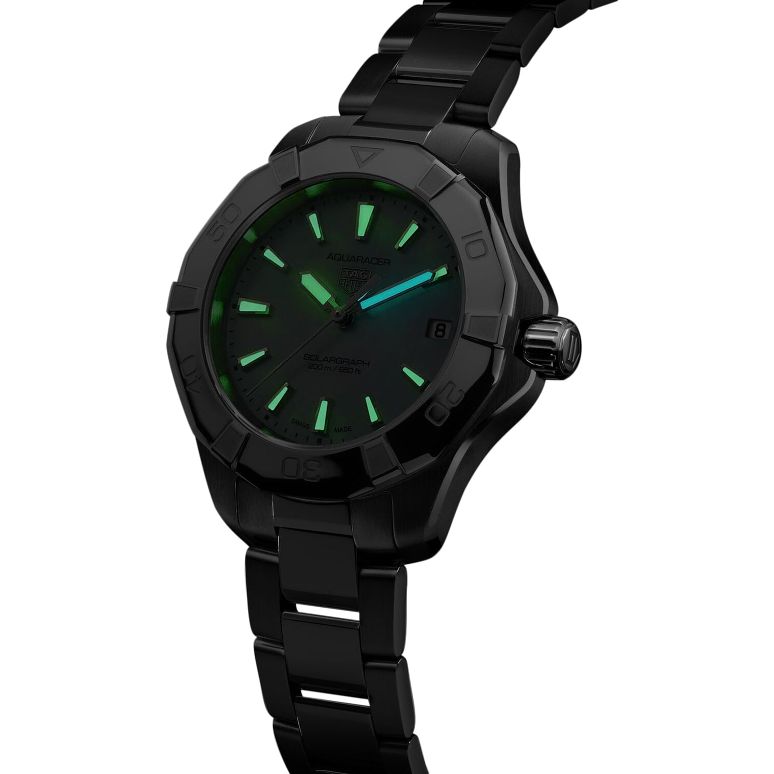 A TAG Heuer Aquaracer 200 Professional Solargraph wristwatch in black metal with a glowing green dial and markers, date display at 3 o’clock, photographed on a white background.