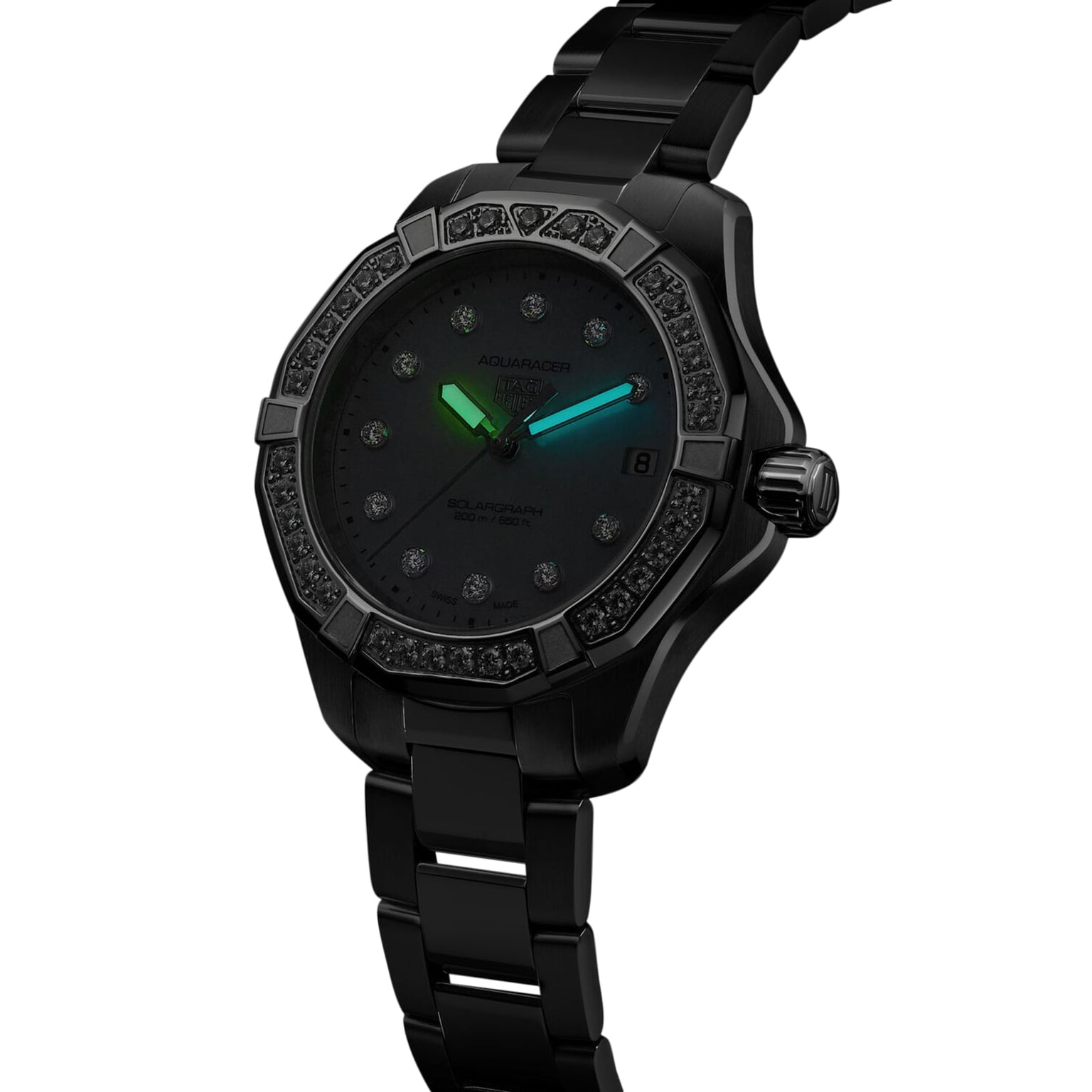The TAG Heuer Aquaracer 200 Professional Solargraph, shown at an angle, features a black dial, gem-set bezel, and solar-powered Solargraph module with luminous green and blue hands.