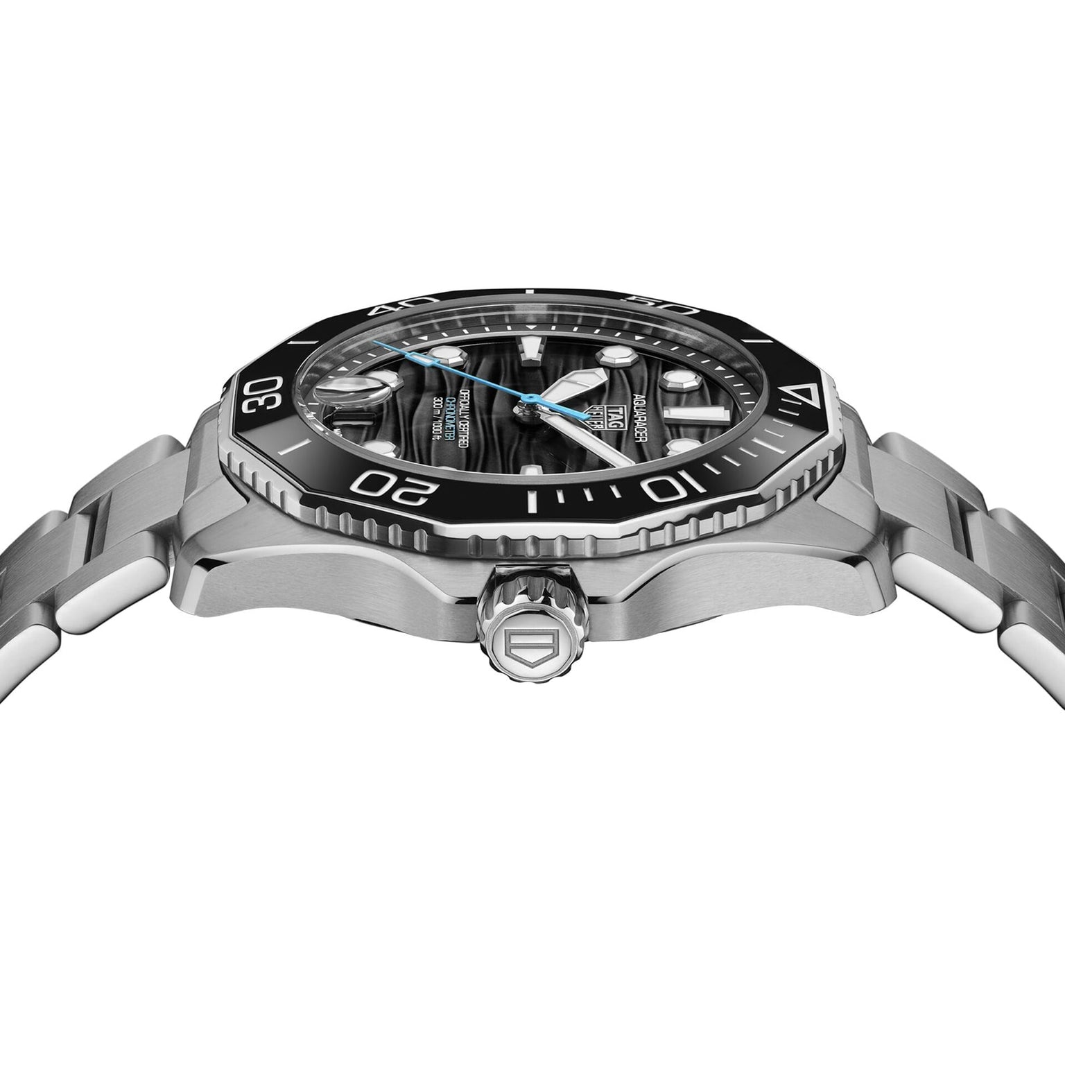 Side view of a TAG Heuer Aquaracer Professional 300 Date, a luxury watch with black bezel, striped dial, luminous hands, and stainless steel bracelet on a white background.