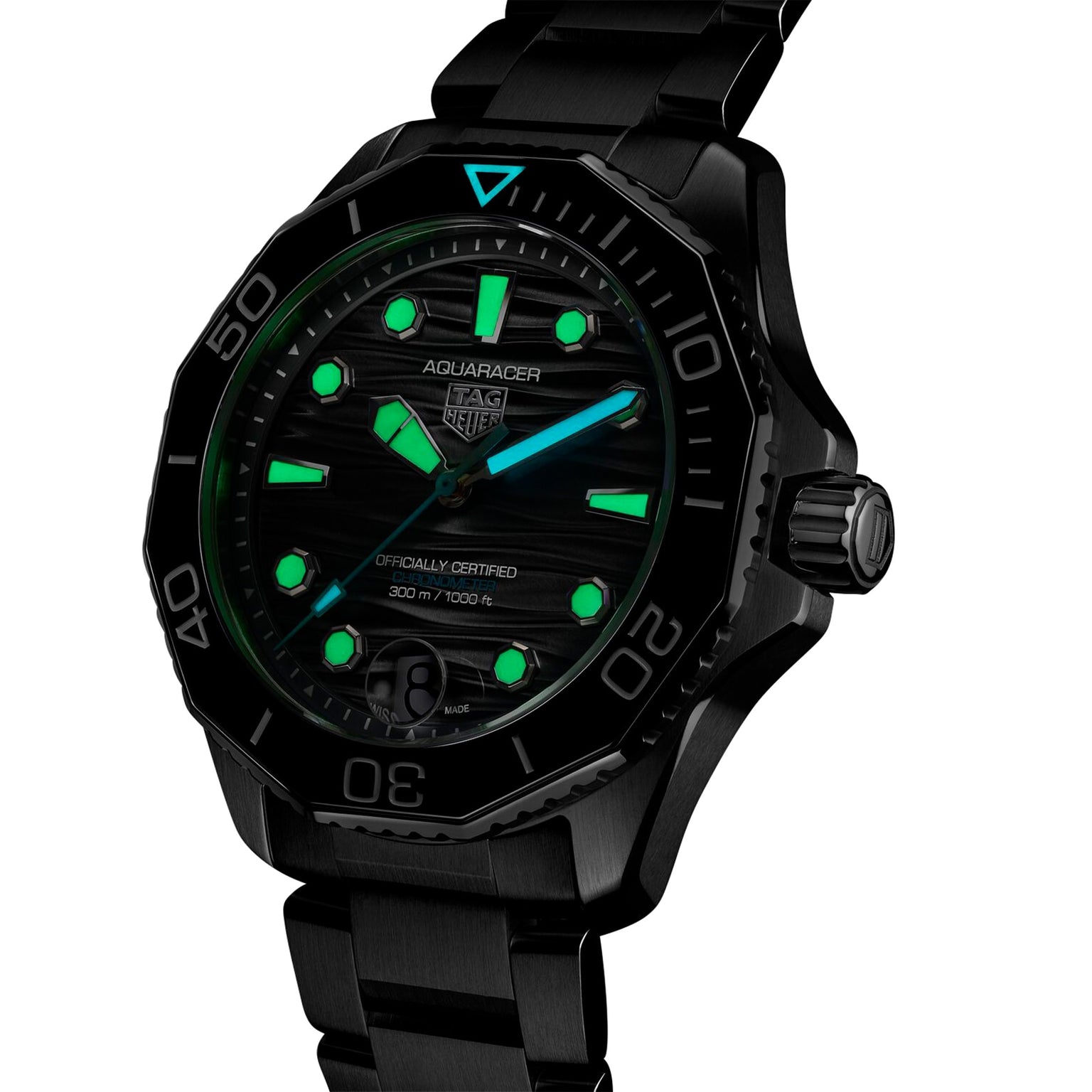 The TAG Heuer Aquaracer Professional 300 Date is a black wristwatch with glowing green and blue markers on a dark dial and a sleek black metal bracelet, making it a standout among luxury timepieces.