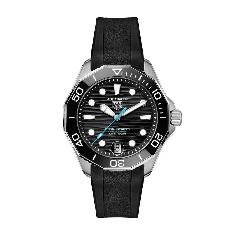 The TAG Heuer Aquaracer Professional 300 Date features a black dial, silver hour markers, blue accents on the second and minute hands, and a black rubber strap—a striking luxury timepiece.