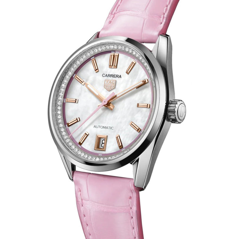 The TAG Heuer Carrera Calibre 7 features a mother-of-pearl dial, rose gold-plated indexes, diamond bezel, date display, and a pink leather strap.