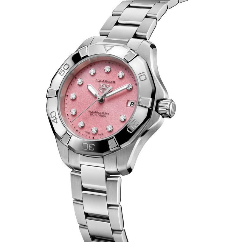 TAG Heuer Professional 200 Solargraph watch with a pink face, diamond hour markers, and a silver metal link band.