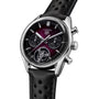 The TAG Heuer Carrera Chronograph Tourbillon Limited Edition features a black leather strap and a burgundy-black dial with three subdials.