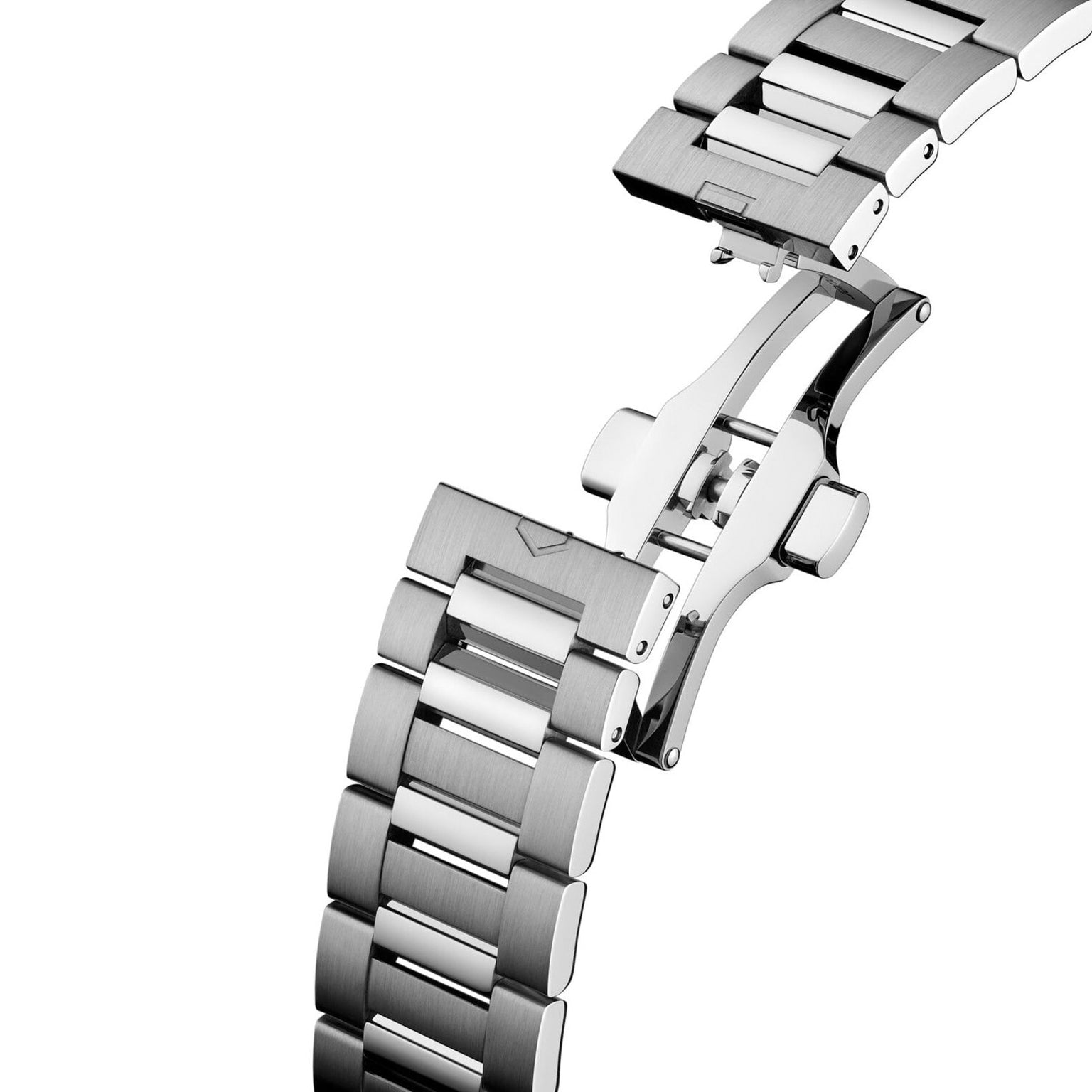 A close-up of the TAG Heuer Carrera Day-Date stainless steel bracelet featuring an open deployment clasp.