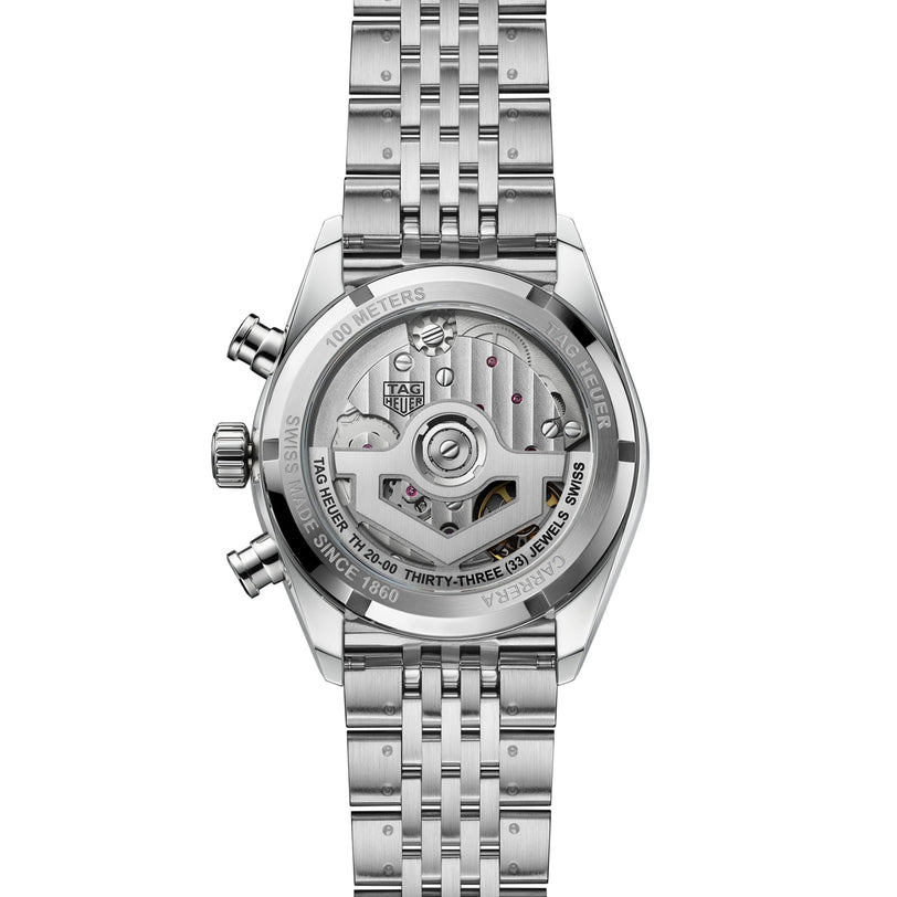 A close-up of the back of the TAG Heuer Carrera Chronograph showcases its visible mechanical movement in a stainless steel case.