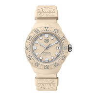 Beige TAG Heuer watch on a white background