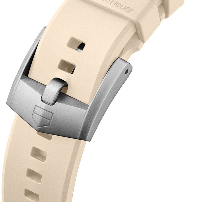 Close-up of a watch strap with a metallic clasp on a white background