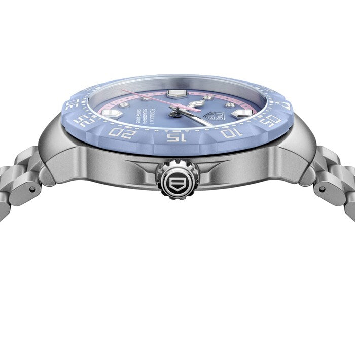 Silver watch with a blue face on a white background