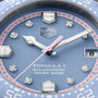 Tag Heuer watch face with blue dial and diamond accents