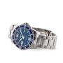 The Longines HydroConquest is a stainless steel diving watch featuring a blue dial, silver hour markers, date display, and metal link bracelet. Stylish and water resistant, it suits everyday wear and aquatic adventures. Shown on a white background.