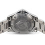 Back view of the Longines HydroConquest watch featuring an engraved case back with the brand’s logo, winged hourglass emblem, and text emphasizing its water-resistant design.