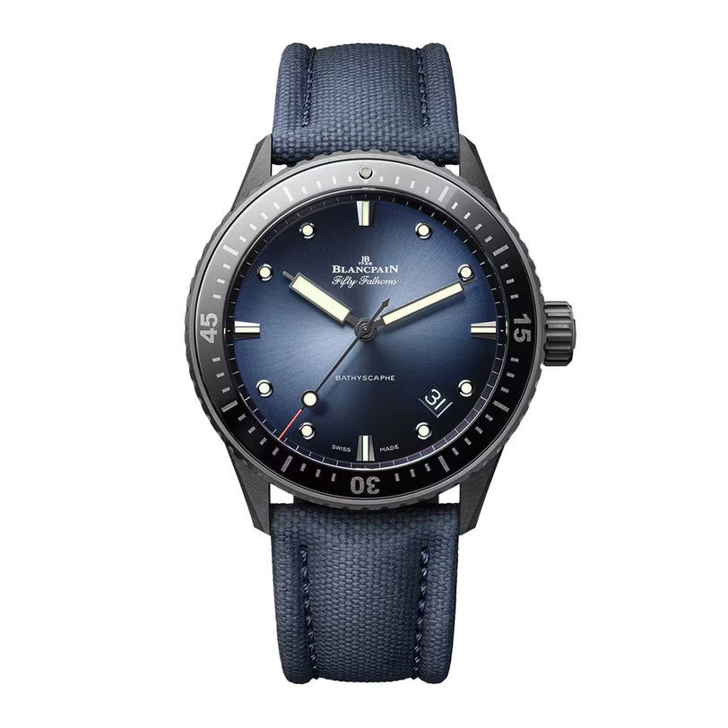 Blancpain Fifty Fathoms Bathyscaphe watch with sunburst blue dial, luminous hands, dark canvas strap, and rotating bezel.