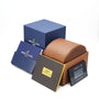 The Breitling Superocean Heritage B20 Automatic 44 packaging includes a blue box, brown leather case, instruction manual, warranty card, and documentation arranged on a white background.