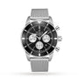 A Breitling Superocean Heritage B01 Chronograph 44 in stainless steel, featuring a black dial with three subdials and a mesh bracelet, is displayed against a white background.
