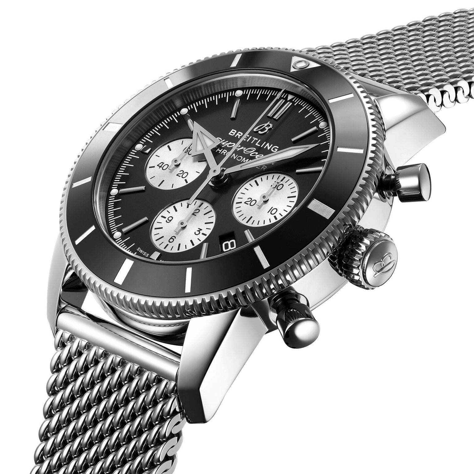 The Breitling Superocean Heritage B01 Chronograph 44 features a stainless steel case, black bezel and dial, three subdials, a metal mesh strap, and is powered by the Breitling 01 calibre, displayed at an angle.