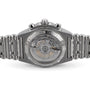 Close-up of the Breitling Chronomat B01 42’s back, highlighting its transparent stainless steel case, intricate inner movement, and detailed engraved markings on the casing and bracelet.