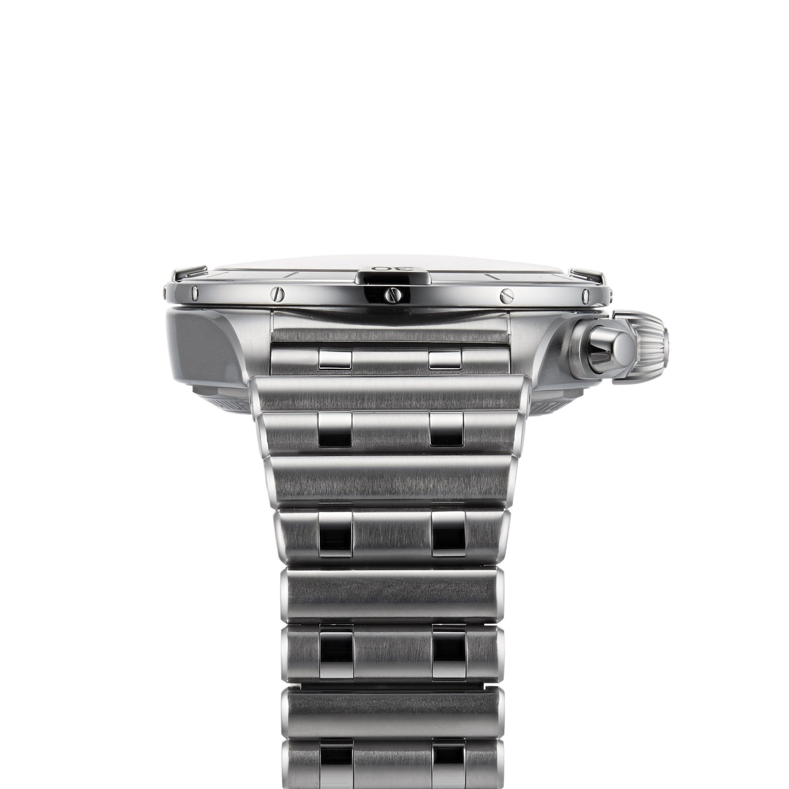 A close-up side view of the Breitling Chronomat B01 42 wristwatch, featuring a stainless steel case, metal link bracelet, visible crown, and bezel screws, shown on a white background.