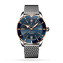 The Breitling Superocean Heritage B20 Automatic 42, featuring a stainless steel case, blue dial with gold accents, luminescent hands, date display, and mesh strap, is displayed against a white background.